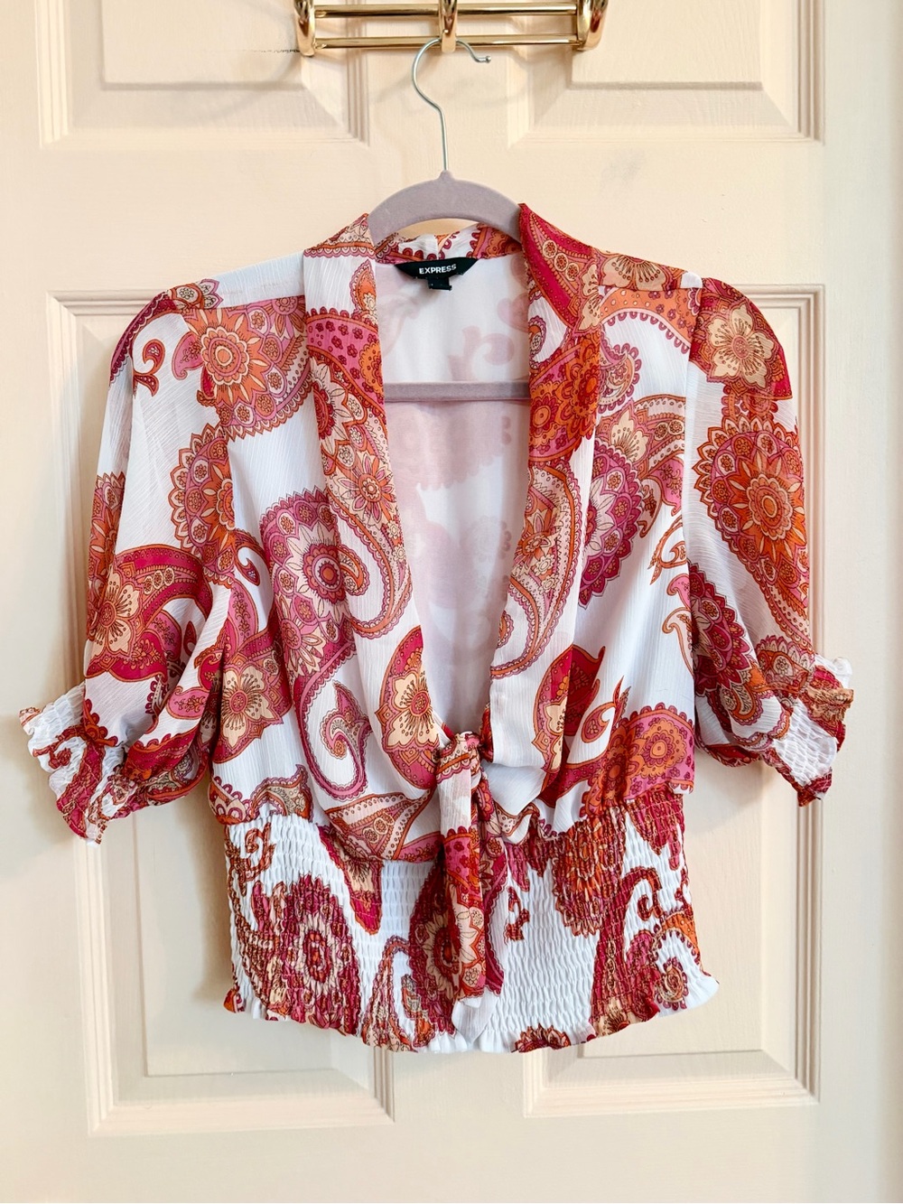 Orange paisley express top